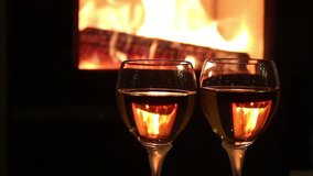 Wine glasses in front of fireplace fire,
clip in photo jpeg