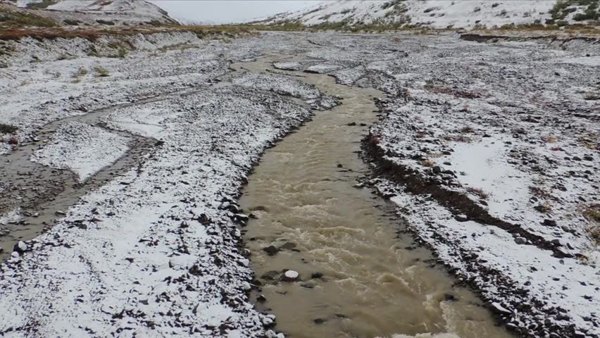 A first snow covers Stony Creek in Denali National Park, Alaska.
