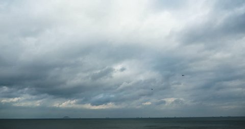 4k sparkling ocean sea water waves surface&coastal rock reef coast cloud cloudscape.dark clouds.altocumulus,high cumulus cloud,mackerel sky. gh2_08318_4k