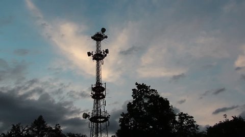 Radio tower in the evening, time lapse