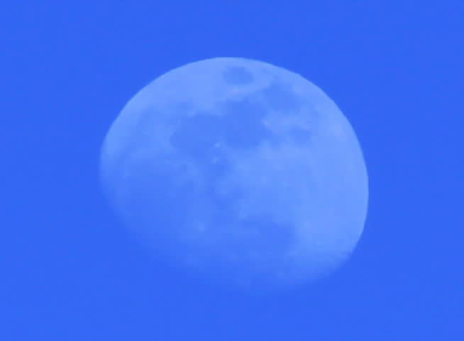 The moon as seen through a telephoto lens.