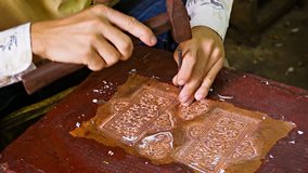Video 1080p - Making traditional coinage. Cambodia.Siem Reap