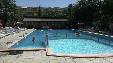 VARNA, BULGARIA - JULY 28, 2014: The pool at the hotel in Bulgaria. Shot in 4K.