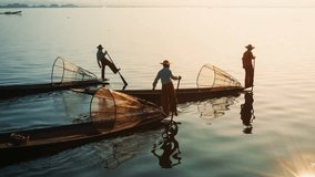 Video 1080p - Myanmar. Inle Lake. Fishermen on vintage boats sail home with a catch