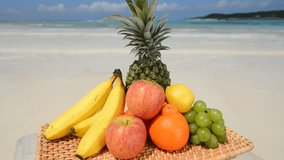 Exotic tropical fruit on the sandy shore