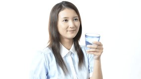 Asian woman drinking fresh water