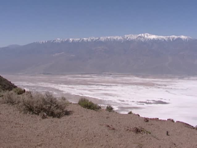 Death Valley, Dantes view: Badwater, salt deposits, Panamint Range and the surrounding desert - pan across the lowest point in the Western Hemisphere and one of the hottest places in the world.