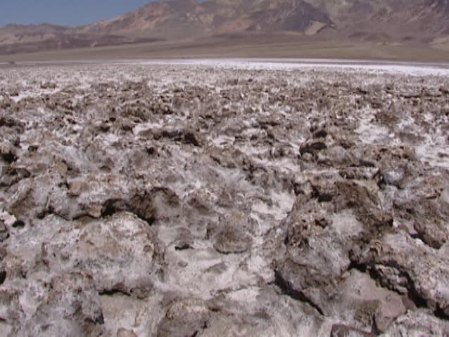 Devils Golf course, salt pan in Death Valley, Badwater - tilt up rough texture from large halite salt crystal formations