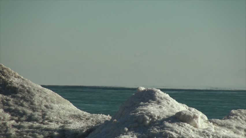 Mountains of ice on the beach. Ice formation at Lake Michigan Beach in Kenosha, Wisconsin 