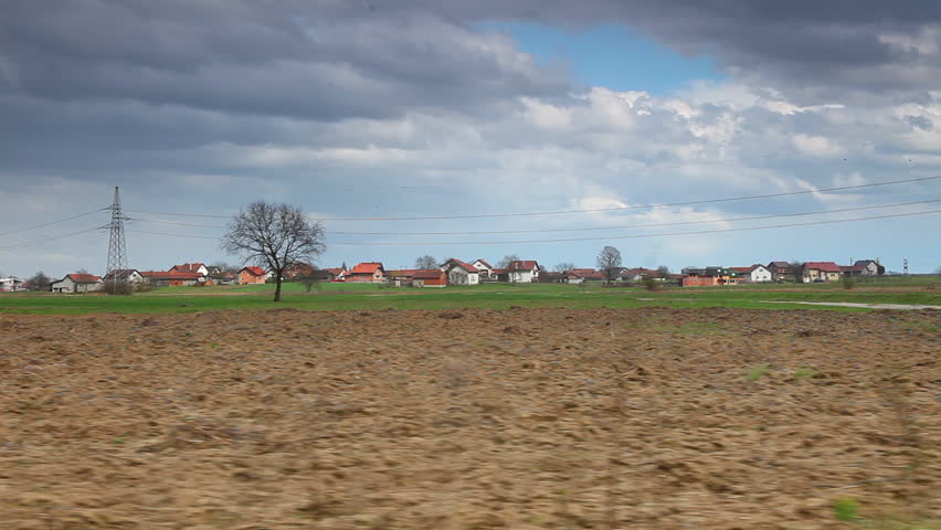 Driving car through country before storm Part1