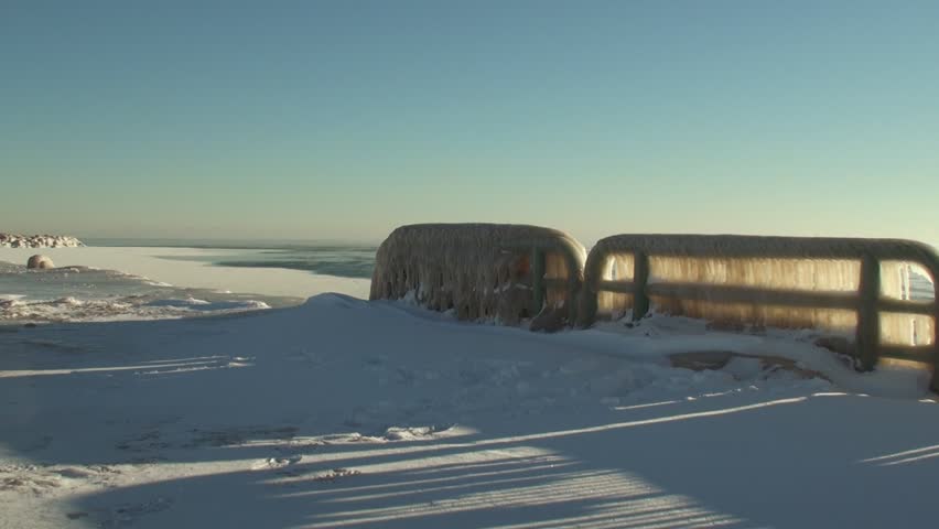 Panning left to right of Lake shore in Racine. Wisconsin covered in ice 2.
