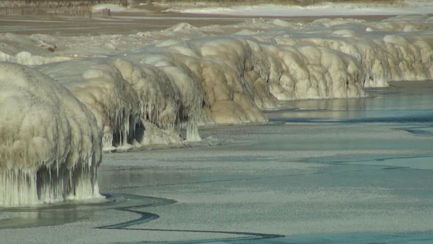 Zoom out of frozen Beach in Kenosha, Wisconsin.