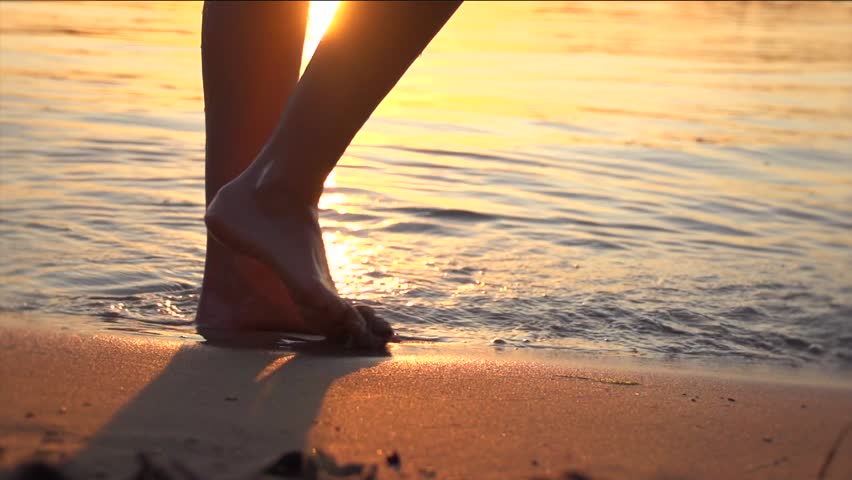 running on the beach without shoes