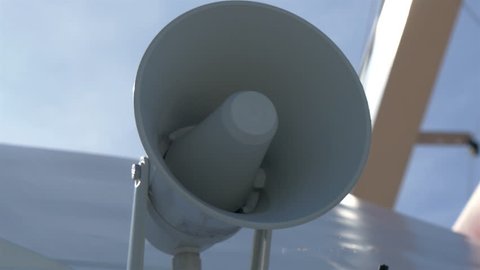 A white small megaphone attached on the yacht on dock on the harbour of Estonia GH4 4K