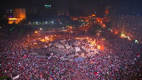 View overlooking an enormous nighttime rally in Tahrir Square in Cairo, Egypt.