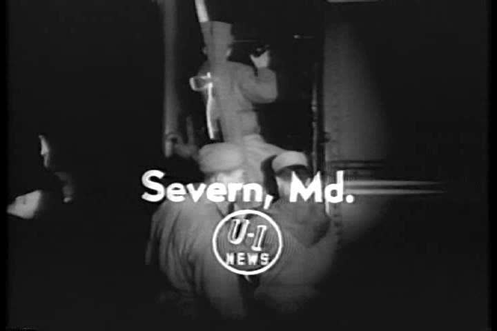 CIRCA 1950s - The dead and the dying are removed from the train wreck in Severn, Maryland in 1956.