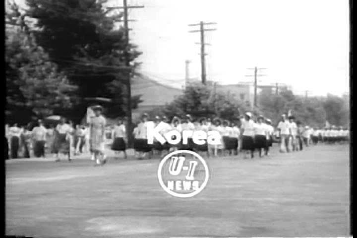 CIRCA 1950s - Koreans hold a parade to thank Texas for the farming and livestock gifts in 1955.