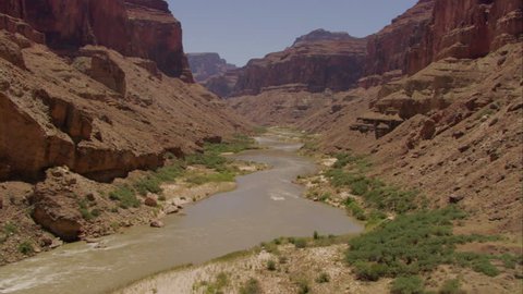 CIRCA 2010s - Fast low aerial over the Colorado River in the Grand Canyon.