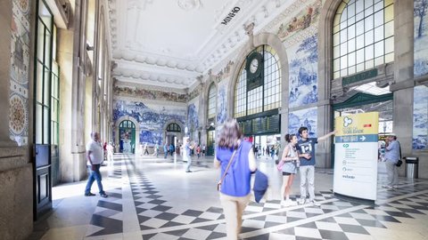 CITY OF PORTO, PORTUGAL - 04 AUGUST 2014: Azulejo panels in Sao Bento Railway station hall in the historic centre of Porto, officially designated by UNESCO as World Heritage Site in 1996.