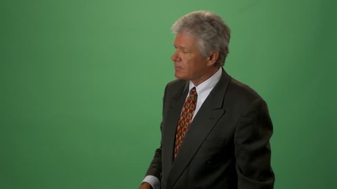 A Television Weatherman Against Green Screen.