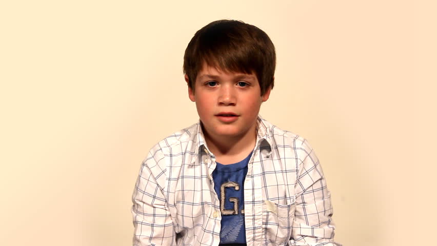 A young boy wears 3D glasses.