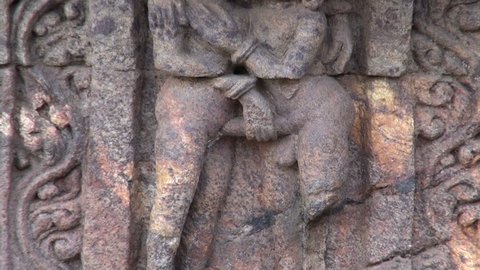 beautiful ancient erotic sacred art sculptures on Konark sun temple wall, Odisha, India