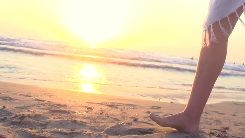 girl walking on beach