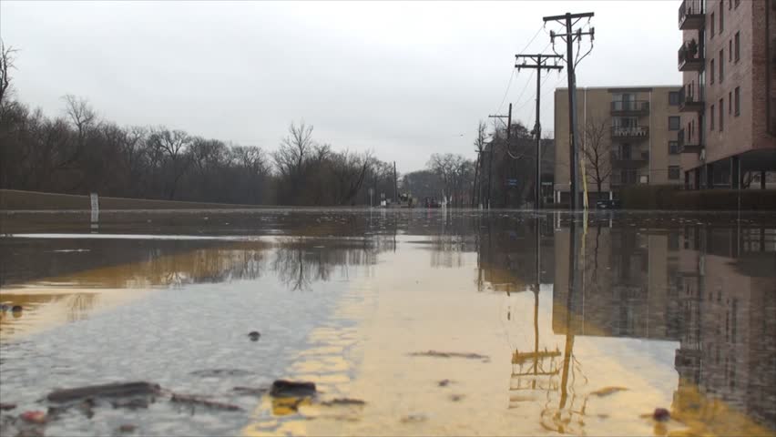 Water on the road 3. This is one of many flooded street due to the overflowing Des Plaines River after heavy rainfalls. At that time Flood stage in this area was 9.6ft, major flooding stage is 9.0ft.