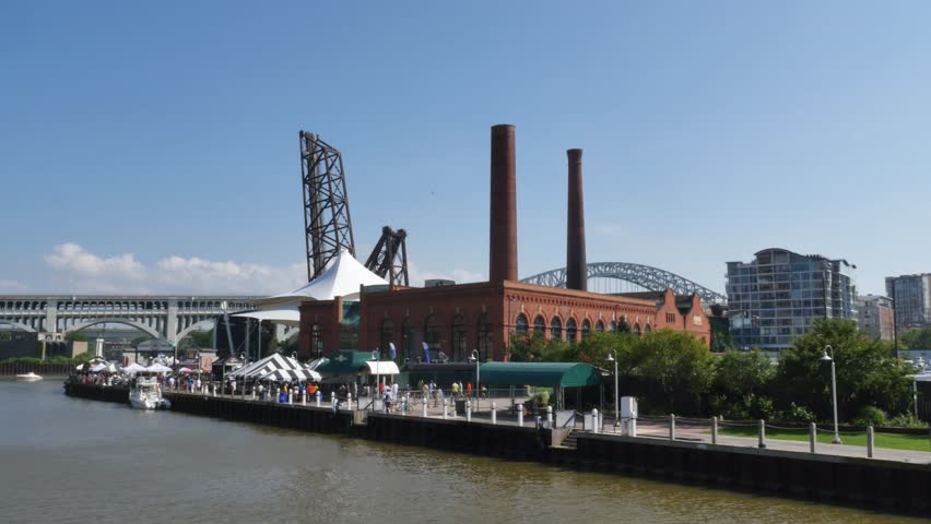 CLEVELAND, OH - Circa August, 2014 - People enjoy The Flats on the shores of the Cuyahoga River in Cleveland, Ohio.