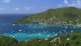 Moving Camera. Many ships and nice clouds in this Time Lapse Movie on Bequia Island, St. Vincent & The Grenadines, Caribbean