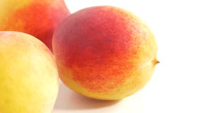 Peaches juicy fruit close up UHD 4k 2160p footage panning on white background - Juicy peach on white background 3840X2160 UHD fruit video