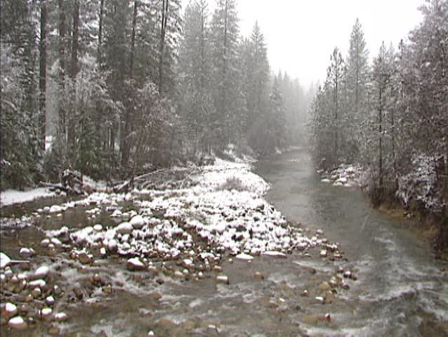 Snowfall at the Chilnualna river, Yosemite National Park