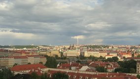Fast moving clouds over Prague in autumn (pan)