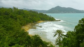 UltraHD video - Laem Sing beach. Phuket island. Thailand. Top view. Rainy season.