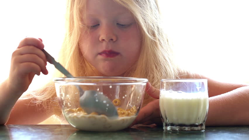 Beautiful Little Girl Eating Cereal Stock Footage Video 100 Royalty