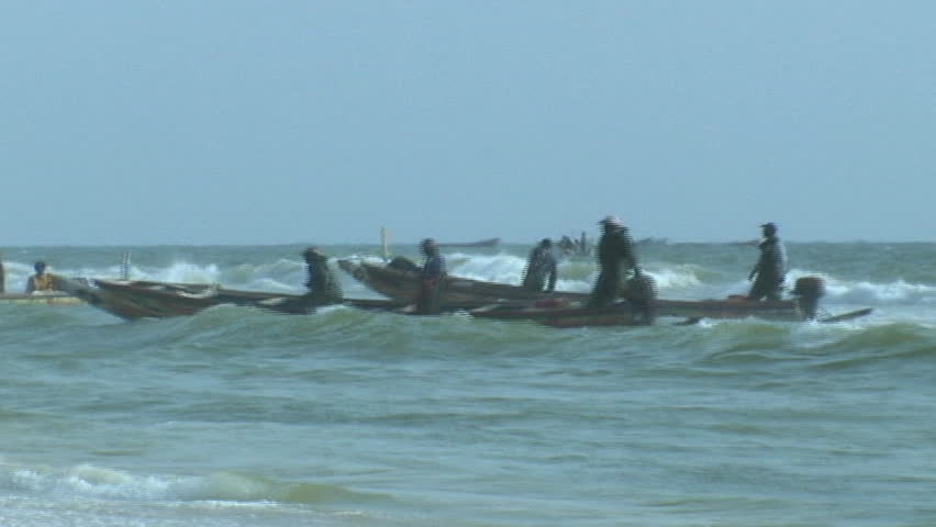 Canoes in Africa coming into shore