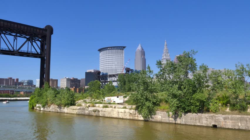 CLEVELAND, OH - Circa August, 2014 - The Cleveland skyline as seen from the Cuyahoga River on a summer day.