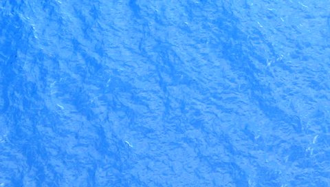 Abstract blue water ripple with raining texture background

