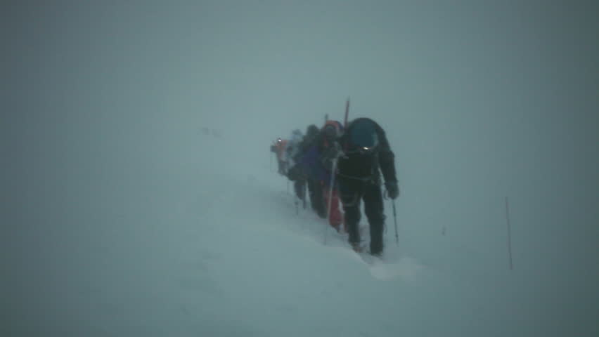 climbers are going on the top of summit