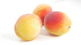 Peach fresh juicy fruit UHD 4k 2160p footage panning on white background - Peach on white background 3840X2160 4K UHD fruit video