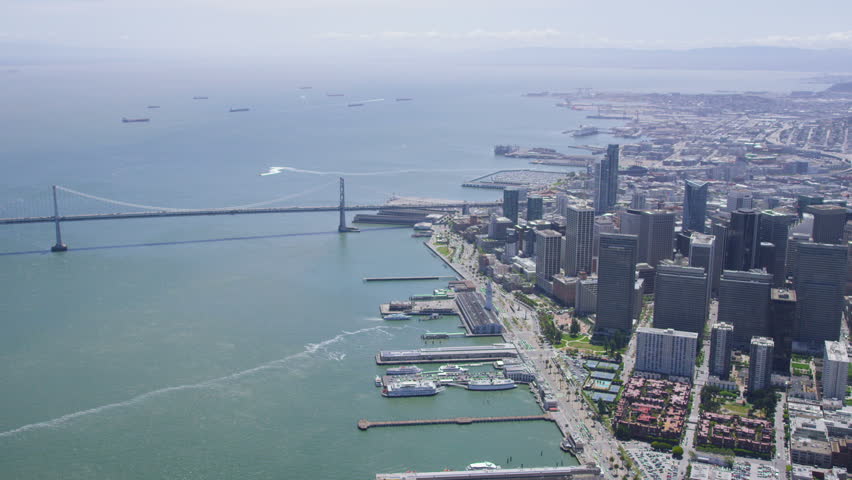 Aerial view of San Francisco Business Center, cityscape and Oakland Bay Bridge
