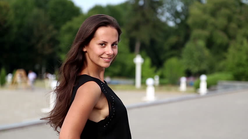 Portrait of a young beautiful girl. Young girl posing in front of the Institute.