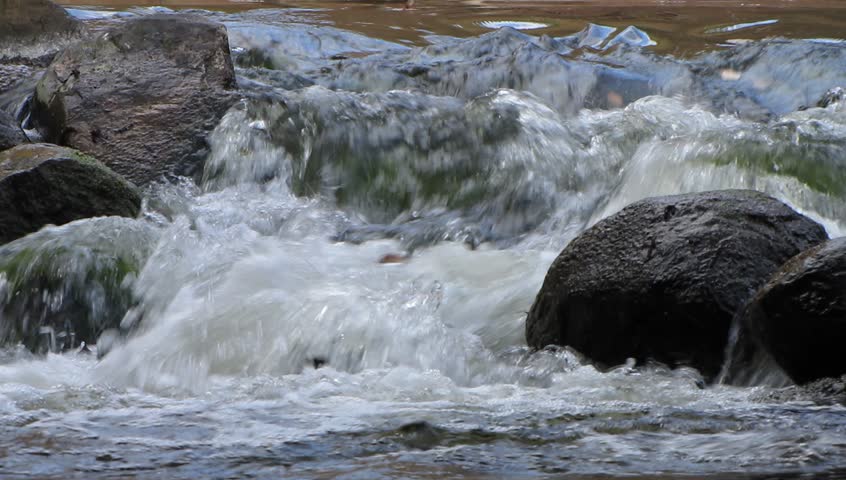 Creek flows between rocks