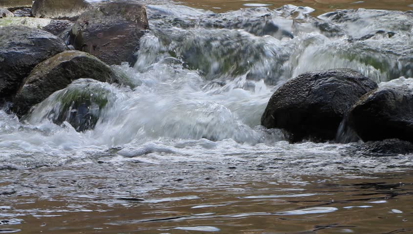 Creek flows between rocks