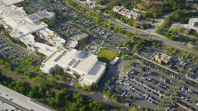 Aerial view of carpark outside shopping Mall  in Los Angeles California with cars and traffic