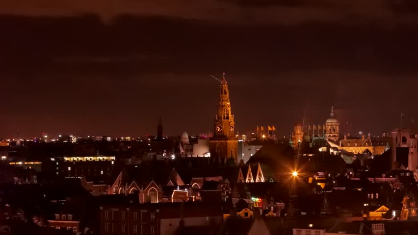 Amsterdam Holland skyline  streets, canals, bridges, buildings, boats, night, timelapse, a large European capital with a number of historical buildings, monuments and museums.