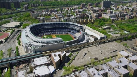 Aerial view of Yankee Stadium in downtown New York City. Helicopter shot of iconic American ballgame arena