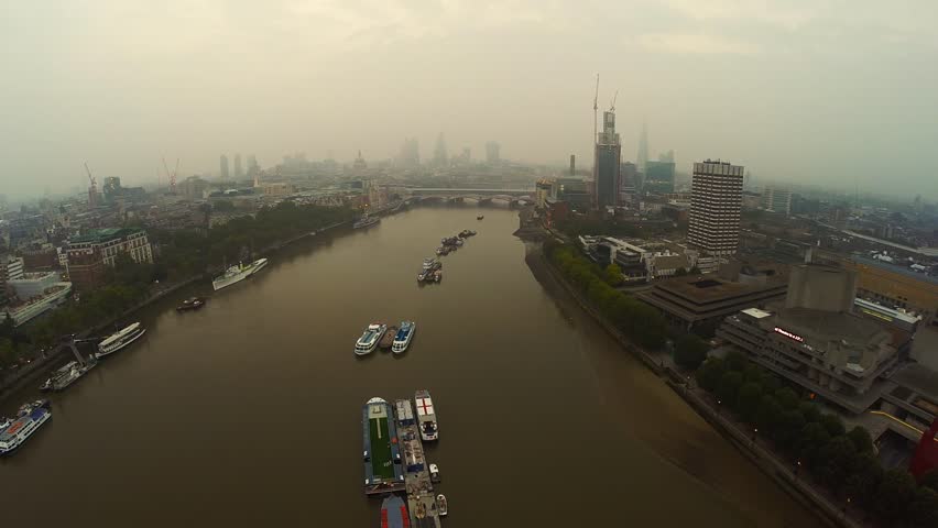 Panoramic aerial shot along the River Thames in Central London, UK