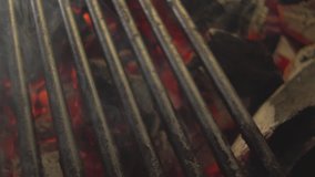 Stock video footage steak thrown on the grill close up