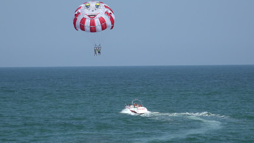 VARNA, BULGARIA - AUGUST 1, 2014: Balloon, parachute over the sea. Shot in 4K (ultra-high definition (UHD)), so you can easily crop, rotate and zoom, without losing quality! Real time.